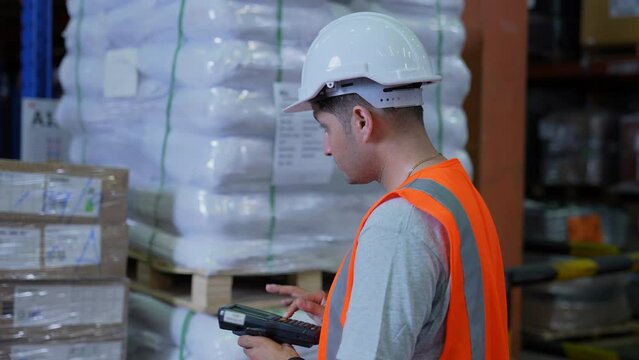 Business concept of 4k Resolution. Employees are collecting product information into the system. barcode scanner.