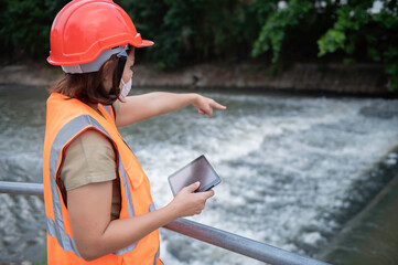 An advanced electrical engineer inspects the electrical system of the waterworks,Maintenance...