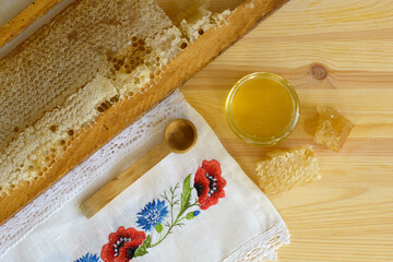 Sweet organic product honey and honeycombs slice. Honey delicacy and healthy dessert.
