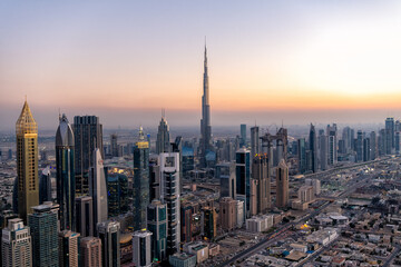 Fototapeta na wymiar Aerial sunset view Dubai skyscrapers Arabian Gulf UAE