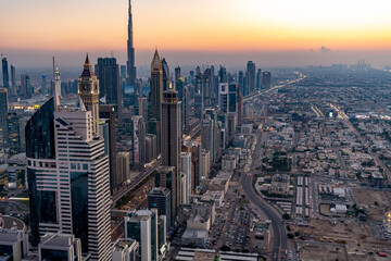 Fototapeta na wymiar Aerial Dubai city skyscraper at sunset travel UAE