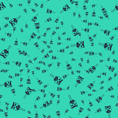 Black Carnival mask icon isolated seamless pattern on green background. Masquerade party mask. Vector