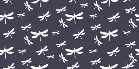 Seamless pattern Dragonflies on dark blue for printing on fabric.