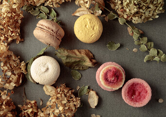 Macaroons with dried flowers.