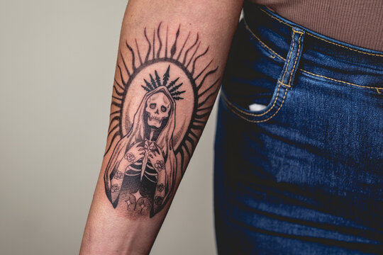 Detail Of New Tattoo Of 'La Santa Muerte' (Our Lady Of Holy Death) In The Arm Of A Woman