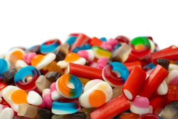 Tasty mix of jelly colorful candies isolated on a white background.