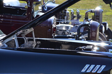 detail of vintage hot rods at a show