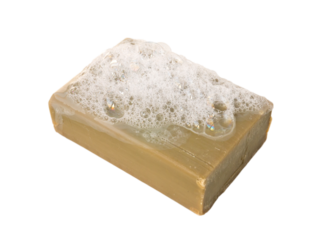 Natural olive oil soap bar with foam isolated transparent png