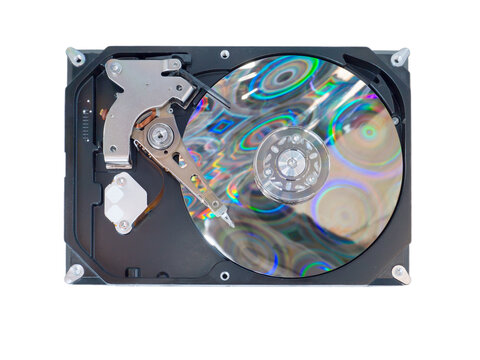 Opened computer hard drive reflecting blurred circles pattern isolated transparent png