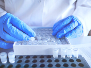 Laboratory scientist working at lab with test tubes. Laboratory concept, woman technician chemist...