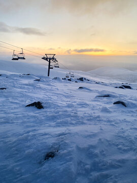 Ski resort at sunset. Nothern winter landscape. ski corduroy.