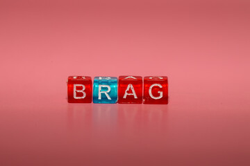 the word "brag" made up of cubes