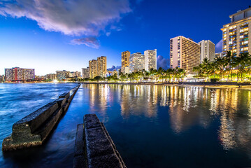 sunset at waikiki beach area in oahu hawaii