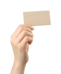 Hand holds blank business card on white background