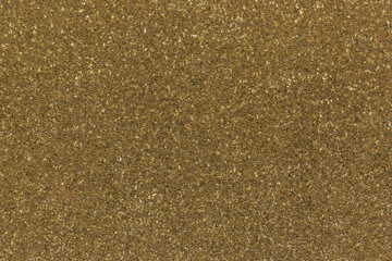 Glitter dark golden textured abstract background