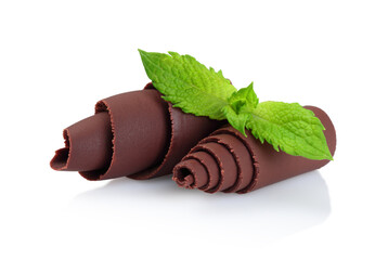 Chocolate Curls with Green Mint Leaves on white background © rvlsoft