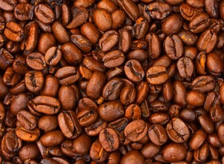 Cereal coffee in bulk on a black background.