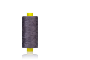 skein of gray thread macro on a white background