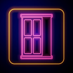 Glowing neon Wardrobe icon isolated on black background. Cupboard sign. Vector