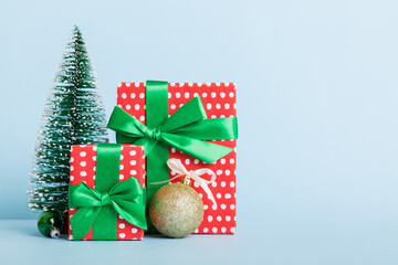 Christmas composition. craft Gift box, small tree, branches and craft DIY decorations on white background. New year concept. Christmas home decoration Flat lay, top view, copy space