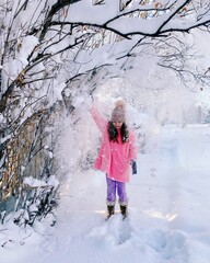 girl walking in winter forest