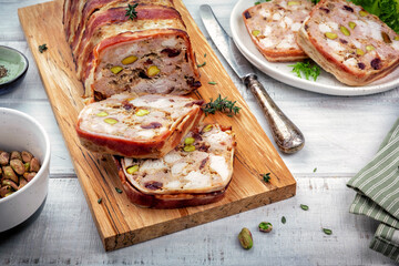 Terrine of pork with pistachios, cherries, chicken and bacon