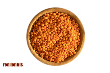Wooden plate with red lentils isolated
