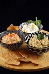 babaganush, hummus and curd with pita bread. arabic cuisine classics