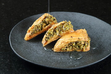 Pistachio puff with honey, classic Arabic sweet