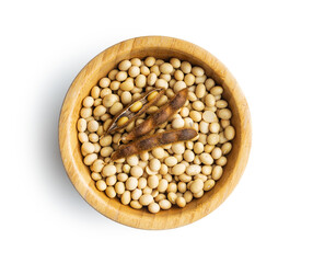 Soy beans. Dried soybean pod in bowl isolated on white background.