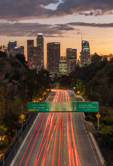 Highway leading into downtown Los Angeles at sunset