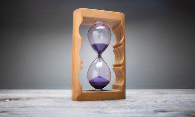 Hourglass on a gray background