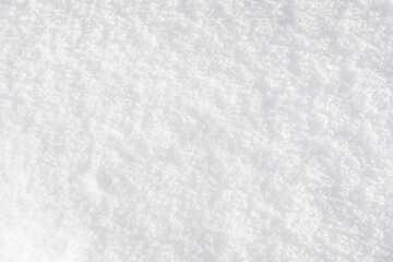 Background of fresh snow texture. Top view of the natural pure snow in winter with copy space.