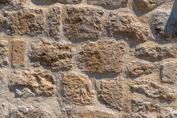 Old stone wall. Vintage stonework background