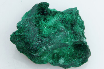 Natural gemstone green malachite on white background
