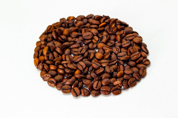 circle of coffee beans on a white background