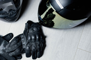 motorcycle equipment, leather gloves and helmets