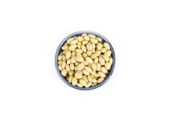 Canary or Mayocoba Beans in Blue Round Pottery Bowl Isolated on White Background in Top Down or Flat Lay Shot