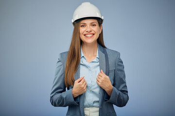 Woman architect wearing safety industrial helmet. Isolated female portrait.