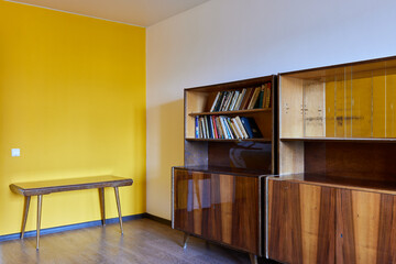 interior of a modern house with vintage wooden furniture