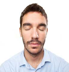 Close up of a young man with eyes closed