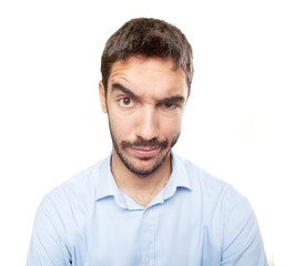 Obraz premium Close up of a doubtful young man