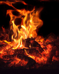 Flames of bonfire or fireplace in the winter night