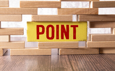 Point Five wooden blocks with POINT text of concept and a light bulb