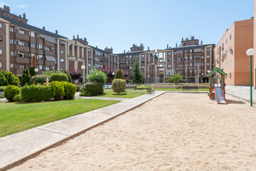 Common areas for children's recreation in an urbanization of residential buildings with a large garden