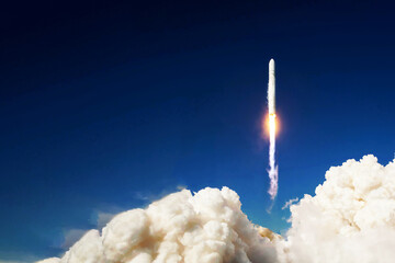 Launch of a space rocket into space. Elements of this image furnished by NASA - Powered by Adobe