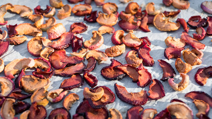 Sun dried apple slices. Raw organic dried apple fruit slices high angle view