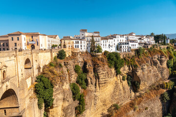Fototapeta na wymiar View of the buildings and the new bridge of Ronda province of Malaga, Andalucia.