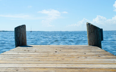 The end of a wooden dock, on the river in Florida
 - Powered by Adobe