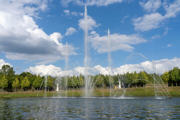 Beautiful musical fountains of the Palace of Versailles, landscape gardening art of France.